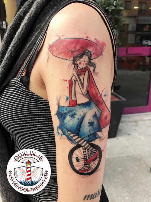 girl on unicycle tattoo